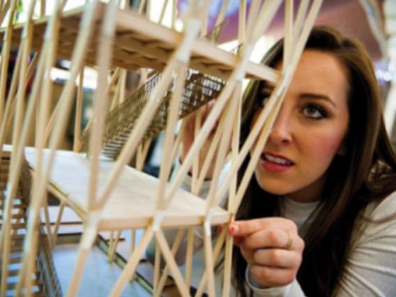 ua student working on an architectural model